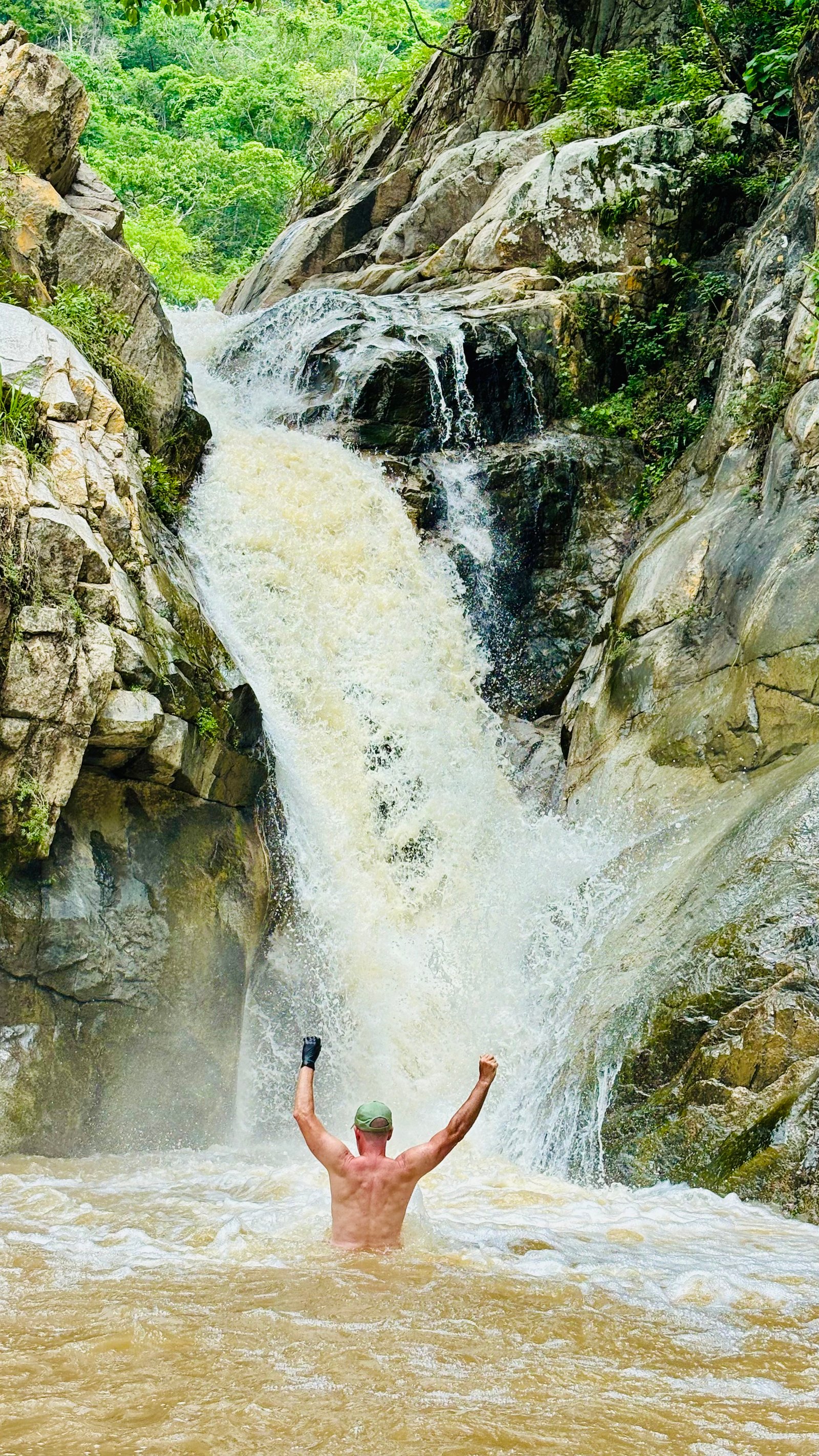 Triumph at waterfall